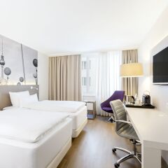 Отель NH Collection Berlin Mitte Am Checkpoint Charlie 4* Улучшенный номер с разными типами кроватей фото 10