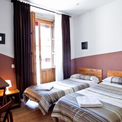 Отель Hostal Abaaly Стандартный номер с 2 отдельными кроватями (общая ванная комната)