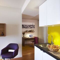 Отель Citadines Les Halles Paris кухня в номере