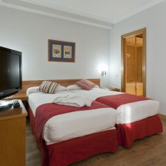 Отель Aparto Suites Muralto Апартаменты с различными типами кроватей