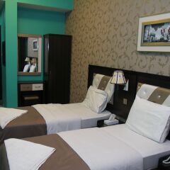 Prime Hotel Стандартный семейный номер с двуспальной кроватью
