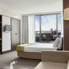 Отель NH Amsterdam Caransa 4* Улучшенный номер с различными типами кроватей