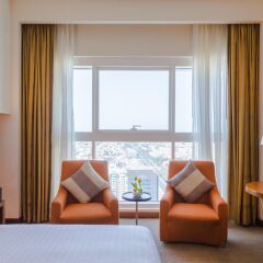 Отель Grand Millennium Al Wahda 5* Стандартный номер с различными типами кроватей