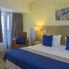 Гостиница Crowne Plaza Moscow World Trade Centre комната для гостей фото 2