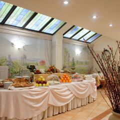 Best Western Hotel Mozart место для завтрака