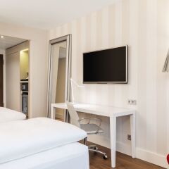 Отель NH Collection Frankfurt City 4* Стандартный номер с различными типами кроватей фото 2