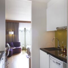 Отель Citadines Les Halles Paris мини-кухня в номере