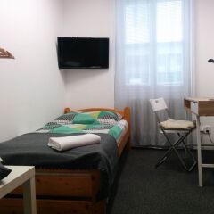 Апартаменты Quiet Courtyard Apartment Стандартный номер с различными типами кроватей