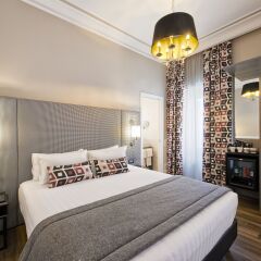Отель The Independent Suites Представительский номер с различными типами кроватей