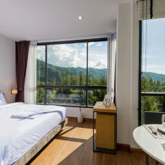 Отель Hill Myna Condotel 3* Номер Делюкс с различными типами кроватей фото 3