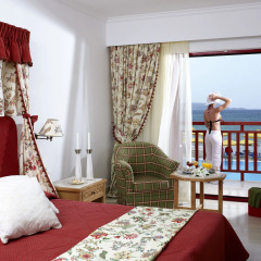 Отель Mitsis Rinela Beach Resort & Spa - All Inclusive 5* Стандартный номер с различными типами кроватей