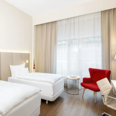 Отель NH Collection Berlin Mitte Friedrichstrasse 4* Улучшенный номер с различными типами кроватей фото 2