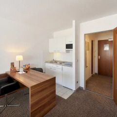 Vi Vadi Hotel downtown munich кухня в номере
