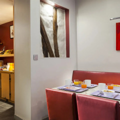 Отель Timhotel Montmartre Париж место для завтрака