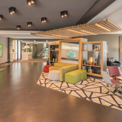 Отель Holiday Inn Munich-Unterhaching Германия, Унтерхахинг - 7 отзывов об отеле, цены и фото номеров - забронировать отель Holiday Inn Munich-Unterhaching онлайн интерьер отеля