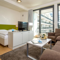 Отель Carat Residenz-Apartmenthaus Апартаменты с различными типами кроватей