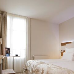 Отель Mercure Paris Opéra Faubourg Montmartre комната для гостей