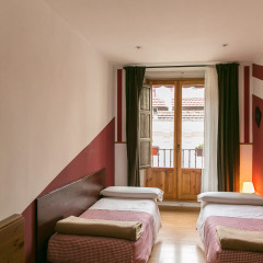 Отель Hostal La Casa de La Plaza Стандартный номер с 2 отдельными кроватями (общая ванная комната)