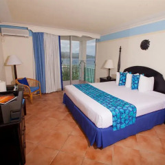 Отель Sunset Beach Resort Spa and Waterpark All Inclusive Ямайка, Монтего-Бей - отзывы, цены и фото номеров - забронировать отель Sunset Beach Resort Spa and Waterpark All Inclusive онлайн комната для гостей фото 4
