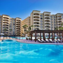 Отель The Royal Caribbean - An All Suites Resort Мексика, Канкун - 9 отзывов об отеле, цены и фото номеров - забронировать отель The Royal Caribbean - An All Suites Resort онлайн собственный двор