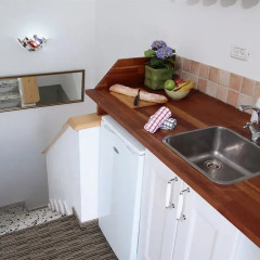 Arbel Suites Hotel мини-кухня в номере