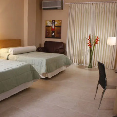 Отель Miami Inn Колумбия, Кали - отзывы, цены и фото номеров - забронировать отель Miami Inn онлайн комната для гостей