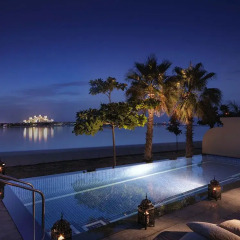 Отель Anantara The Palm Dubai Resort бассейн фото 3