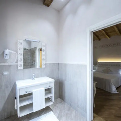 Hotel Sesmones Корнельяно Лауденсе ванная