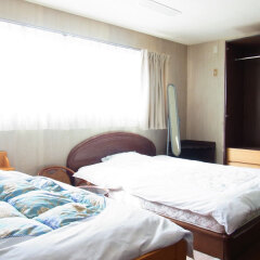 Отель Business Ryokan Tatsumi Минамиавадзи комната для гостей фото 2