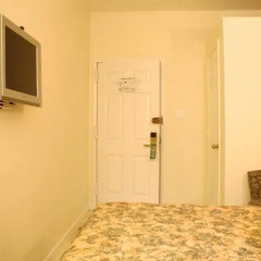 Отель Americana Inn 2* Кровать в общем номере с двухъярусной кроватью