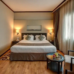 Grandeur Hotel комната для гостей