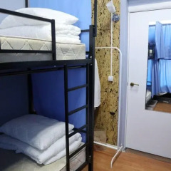 Хостел Travel Inn Выставочная Кровать в общем номере с двухъярусной кроватью фото 9