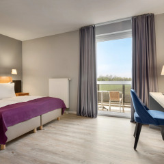 Отель Ramada by Wyndham München Airport Германия, Мюнхен - отзывы, цены и фото номеров - забронировать отель Ramada by Wyndham München Airport онлайн комната для гостей