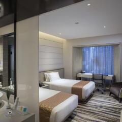 Carlton Hotel Singapore 4* Номер Делюкс с 2 отдельными кроватями
