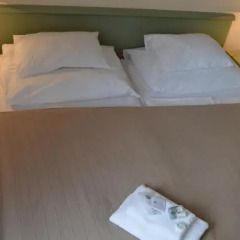Hotel Aréna комната для гостей