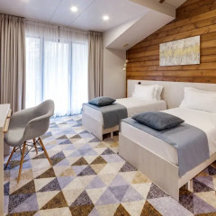 Гостиница LES Art Resort Townhouse Familia с различными типами кроватей