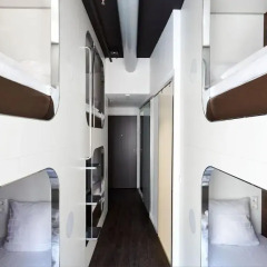 Отель Steel House Copenhagen Кровать в общем номере с двухъярусной кроватью