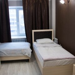 Гостиница Avrora Centr Guest House Номер Делюкс с 2 отдельными кроватями фото 5