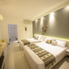 Отель Meraki Resort (Adults Only) 4* Номер Triple trouble с различными типами кроватей фото 2