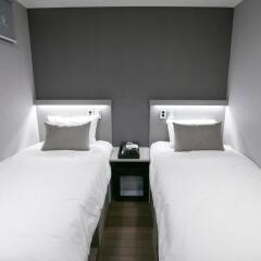Отель Philstay Myeongdong Station Южная Корея, Сеул - отзывы, цены и фото номеров - забронировать отель Philstay Myeongdong Station онлайн комната для гостей фото 2
