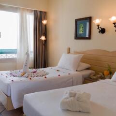 Отель Coral Beach Resort Tiran 4* Стандартный номер с 2 отдельными кроватями фото 4