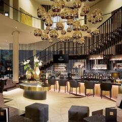Отель Hilton Tallinn Park Эстония, Таллин - отзывы, цены и фото номеров - забронировать отель Hilton Tallinn Park онлайн гостиничный бар