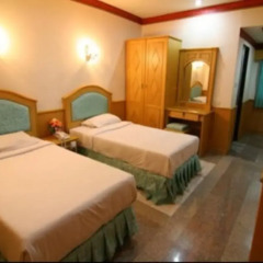 Отель Tacoma Garden Airport Lodge комната для гостей фото 5