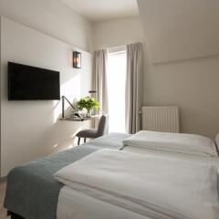 Отель Martins Brugge 3* Семейный номер Charming с различными типами кроватей фото 2