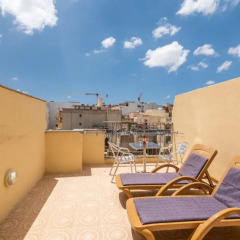 Отель Spinola Bay Penthouse Мальта, Сан Джулианс - отзывы, цены и фото номеров - забронировать отель Spinola Bay Penthouse онлайн балкон фото 3