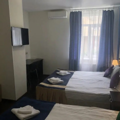Concert Hotel 3* Улучшенный семейный номер с двуспальной кроватью фото 3