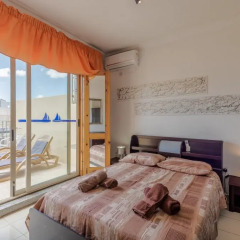 Отель Spinola Bay Penthouse Мальта, Сан Джулианс - отзывы, цены и фото номеров - забронировать отель Spinola Bay Penthouse онлайн комната для гостей фото 2