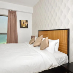 Отель Vacation Holiday Homes - Jumeirah Beach Residences комната для гостей