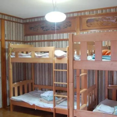 Отель Guest House Aloha Spirit Hakata Station Фукуока комната для гостей