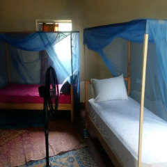 Отель Akwidaa Inn 2* Кровать в общем номере с двухъярусной кроватью